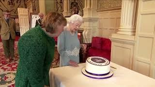 Queen Elizabeth cuts cake to mark 70 years of rule