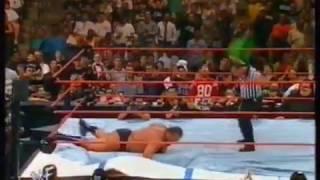 Undertaker choked slammed through ring