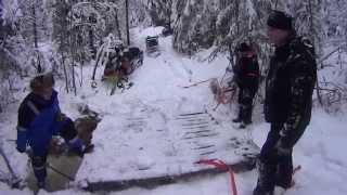 Fixing a snowmobile trail bridge