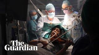 Woman plays violin while undergoing brain surgery