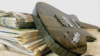 Building a Guitar Out of 700 Sheets of Newspaper