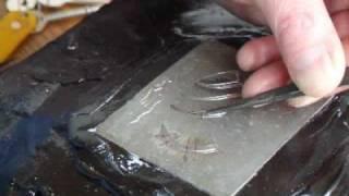 A rather rough and ready demonstration showing the handling of Japanese metal carving chisels.