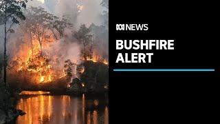 Bushfire emergency warning downgraded on Tasmania's west coast | ABC News