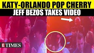 Katy Perry & Orlando Bloom Accept Cherry Eating Challenge At Usher Concert; Jeff Bezos Records Video