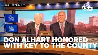 Don Alhart receives key to Monroe County