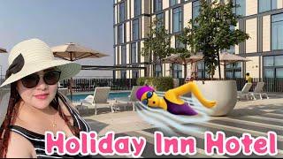 Swimming at Holiday Inn Hotel Dubai