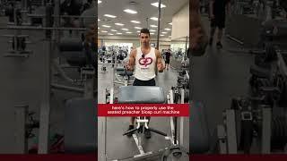 How to Properly Use The Seated Preacher Bicep Curl Machine With Good Form (Exercise Demonstration)