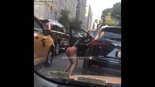 Beautiful woman shaking her ass in NYC traffic