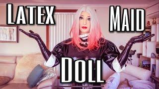 Rubber Doll in Latex Maid Suit and Tight Corset