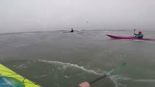 Go Kayaking Staff surfing P&H Sea Kayaks at Rhosneigr