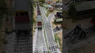 "Knight of the Thistle" pulls freight past the stream and ths signal box.