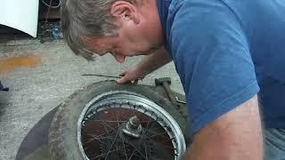 Tyre removal with an old, hard tyre and two badly positioned tyre security bolts for added fun!