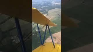 Stearman Biplane Rides passenger takes the controls during hands-on Stearman flight