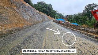 The road was damaged again before being paved due to rainwater