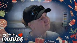 She was working at a pizza restaurant when we walked in with a surprise from a Secret Santa