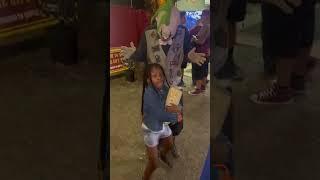 Scared Kid Screams And Runs Away From Clown Standing Behind Her - 1376975