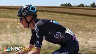 Romain Bardet changes a shoe without stopping his bike during Stage 8 | Cycling on NBC Sports