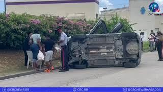 Vehicle overturned in Six Roads trapping driver