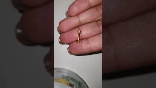 How to remove stuck gun piercing earings easily                #earpierced  #earpiercings