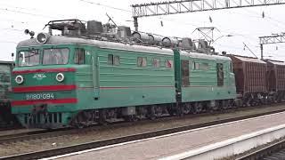 Electric locomotive VL80-094 with freight cars arrives at Grebenka station. Poltava region..