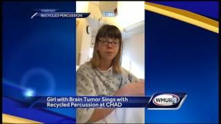 Girl with brain tumor sings with Recycled Percussion's Justin Spencer at CHaD