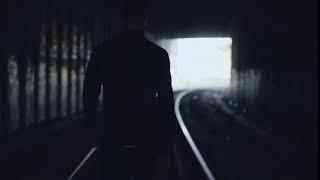 4k concept of depression dark man silhouette back view abstract cinematic shot male walk