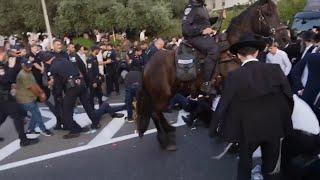 Ultra-Orthodox Jewish men block highway in central Israel in protest of military recruitment