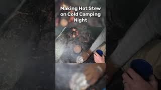 Cooking Food on Cold Camping Night