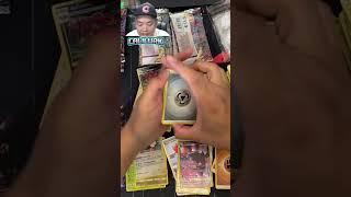 Pulling an alt art giratina from a lost origin booster box