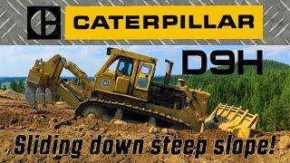 CATERPILLAR D9H sliding down steep slope!