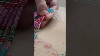 One loom row of a fringe beaded necklace. Full tutorial is already on the channel!