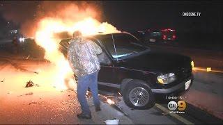 Caught On Tape: Photojournalist Becomes A Hero When He Pulls Man From Burning Car