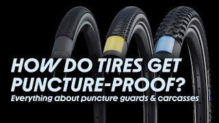 What makes a bicycle tire puncture proof and what is a tire carcass?
