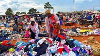 Market day in African  village/Shopping  for food and clothes/African village life