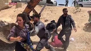 İsrail askerleri Filistinli kadının başörtüsünü yırtarak yerde sürükledi