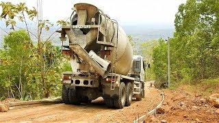 Hino 500 Ready Mix Cement Truck Delivering Pouring Concrete On Hill Road Construction