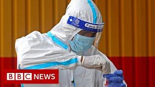 India battles to contain spread of Omicron variant - BBC News