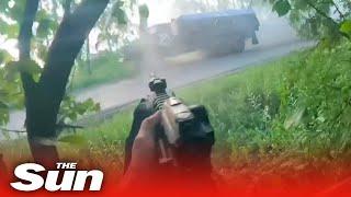 Moment Chechen soldiers ambush Russian truck with machine guns