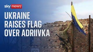 Ukrainian soldiers raise flag over recaptured village of Andriivka