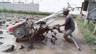 Farmers Plowing The Fields with QUICK TRACTOR KUBOTA G3000 ZEVA