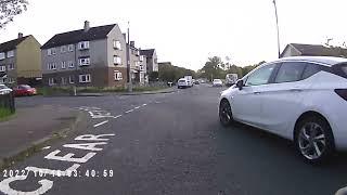 Close pass and turn across cyclist's path