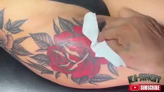 Big red rose tattoo