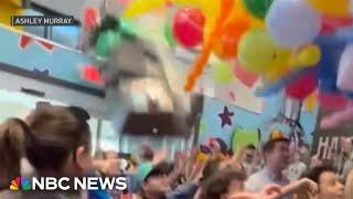 Ten people injured as a toy display falls during a New Year’s Eve event in Massachusetts