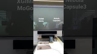 XGIMI MoGo vs. Nebula Capsule 3 mini projector (film in store with all lighting on)