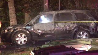 2 bodies found in burning SUV, police say