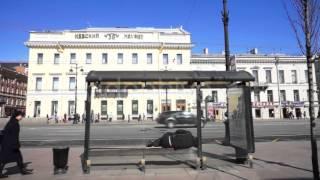 Man Sleeping on Bench of Public Transport Stop, St. Petersburg