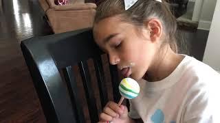 Ella falls asleep while sucking on a lollipop