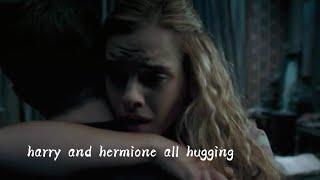 harry and hermione all hugging in the harry potter scenes