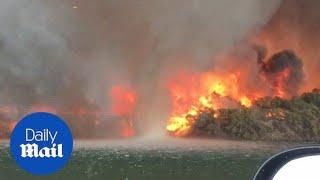 Video shows 'firenado' turns into a giant water spout