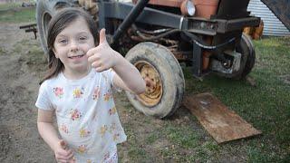 Evelyn and Daddy Repair The Tractor Tire